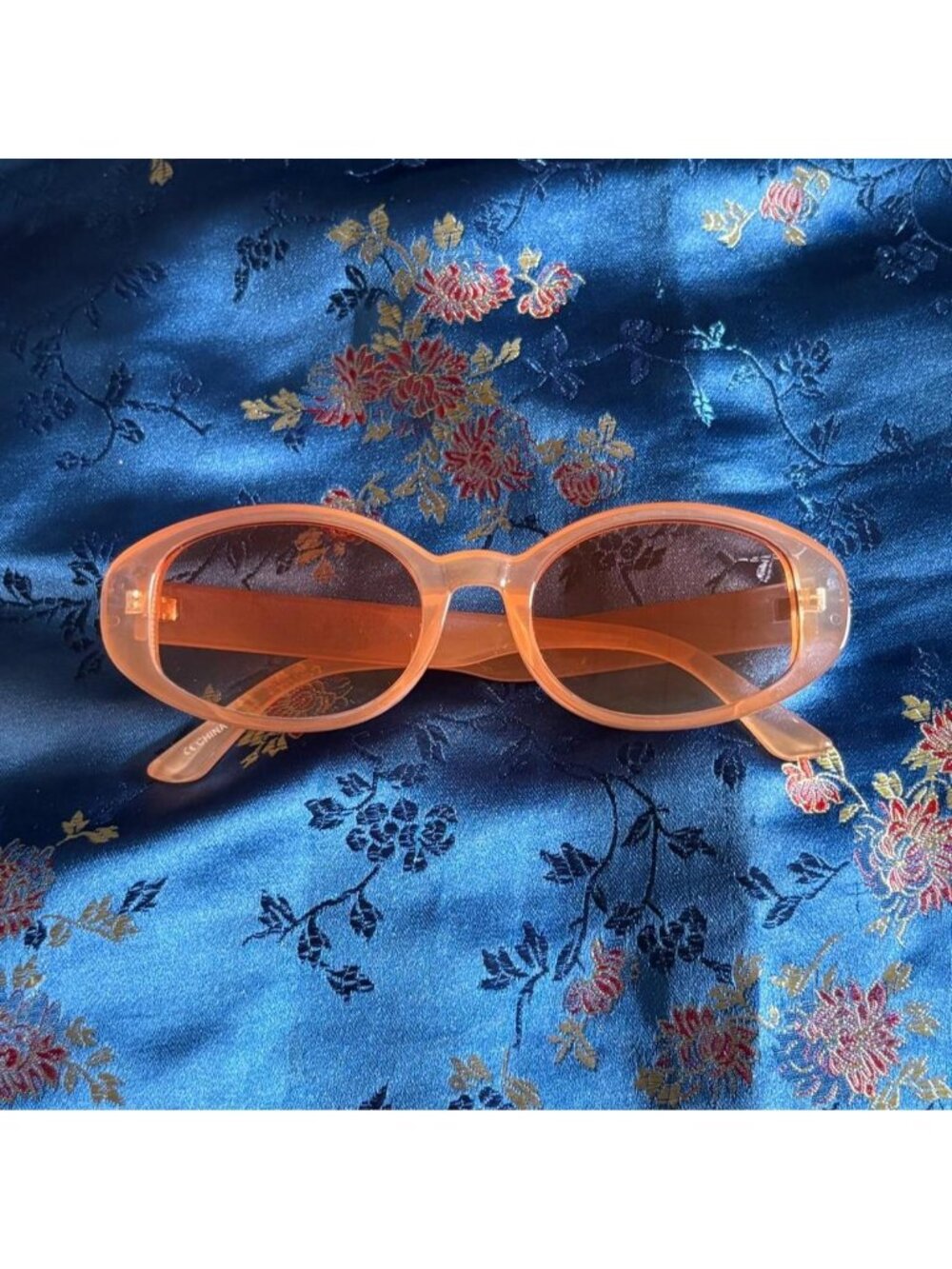 Orange Tinted Oval Sunglasses